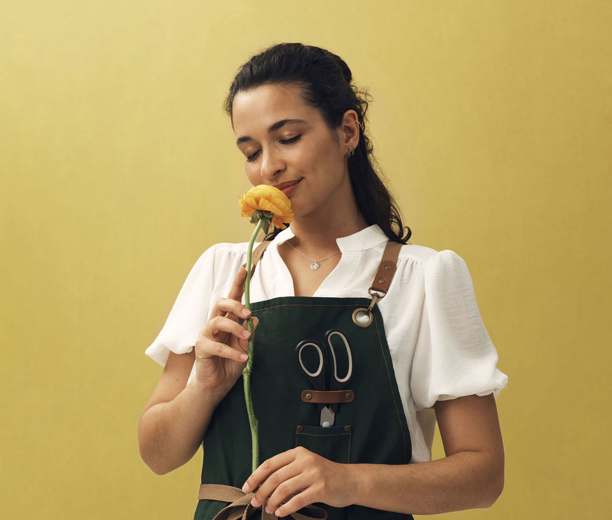 person-smelling-flower-crop3