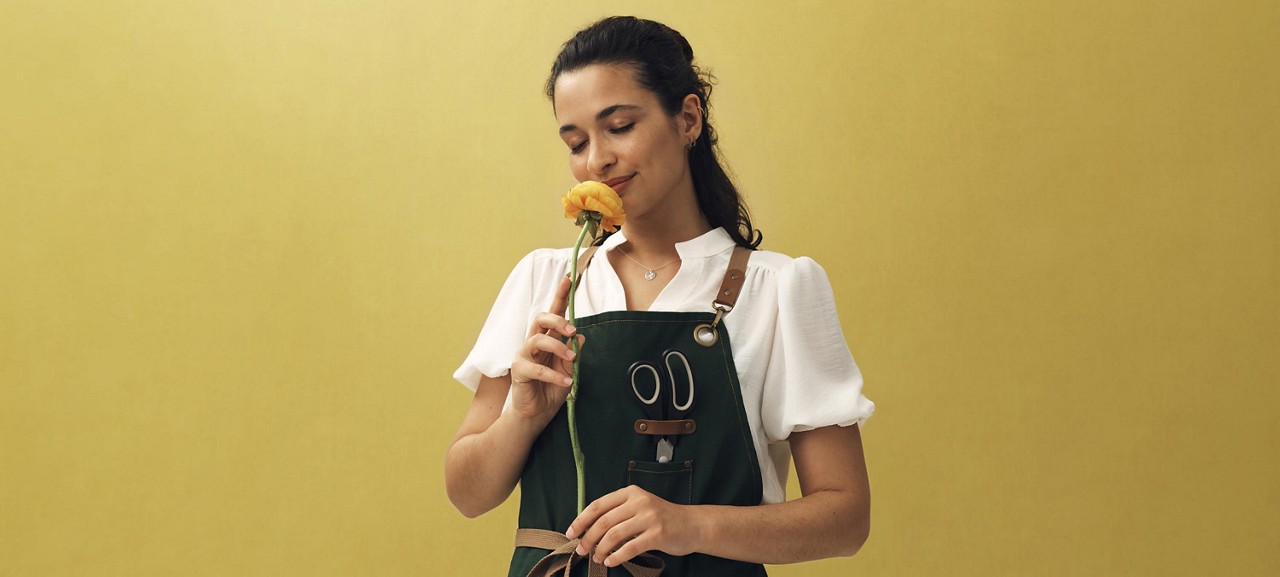 person-smelling-flower-wide2